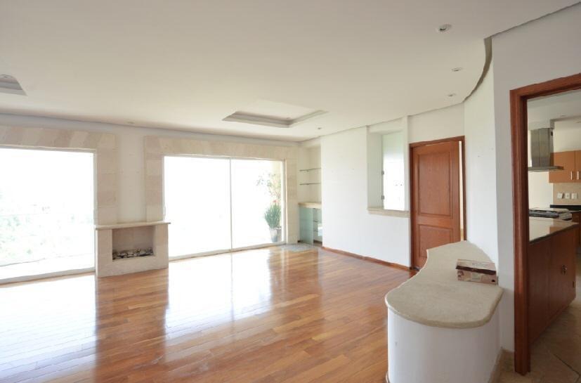 Sala y ventanales · PALMETTO 39 Bosque Real · 220 m²