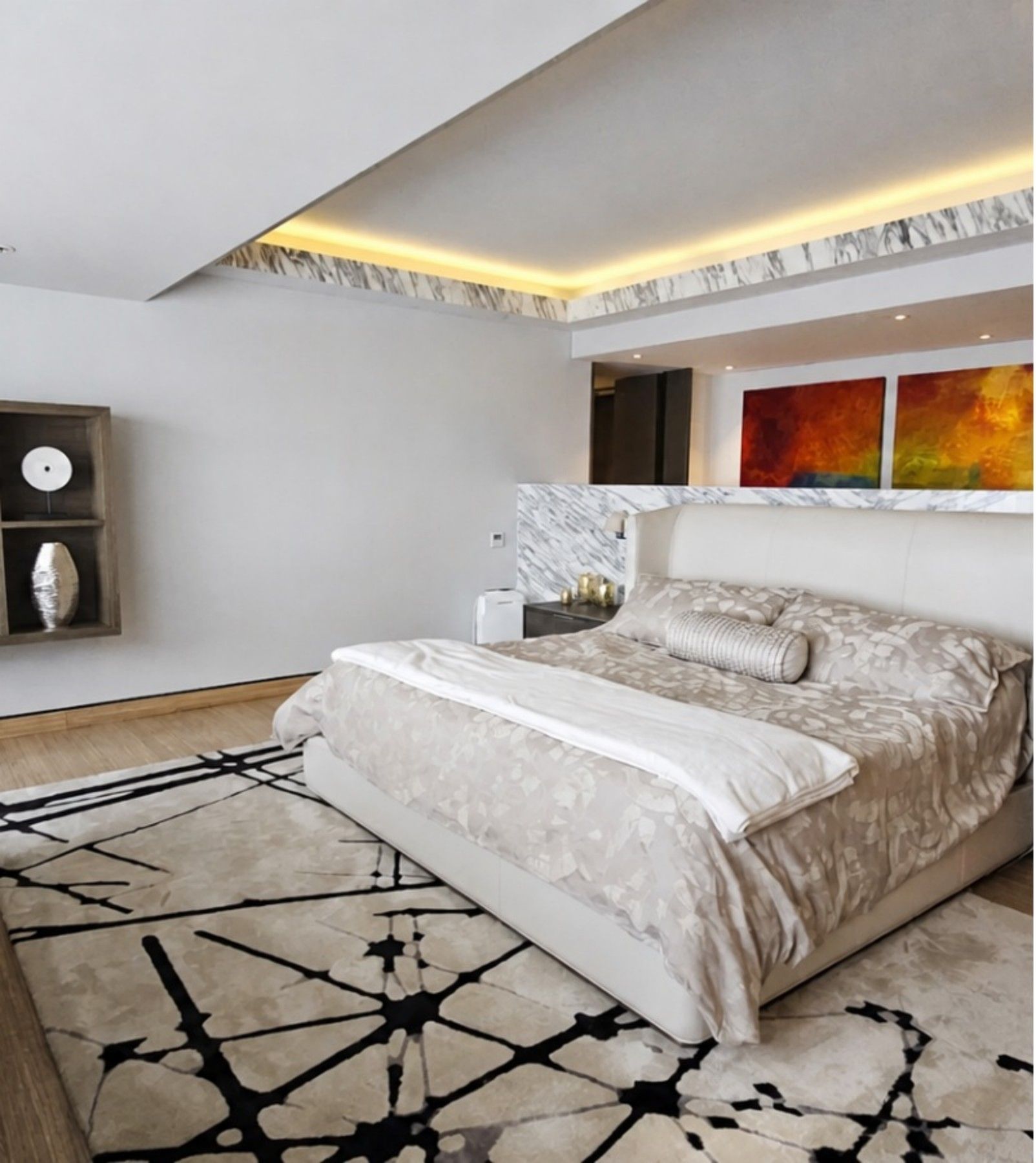 Recámara principal con sala privada y acabados en mármol