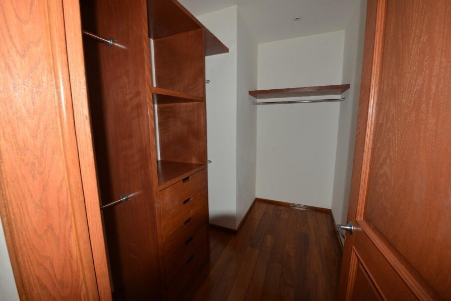 Habitación y vestidor · PALMETTO 39 Bosque Real · 220 m²