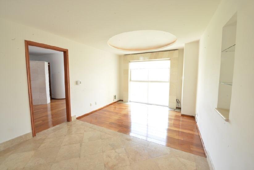 Recámara con ventanal · PALMETTO 39 Bosque Real · 220 m²