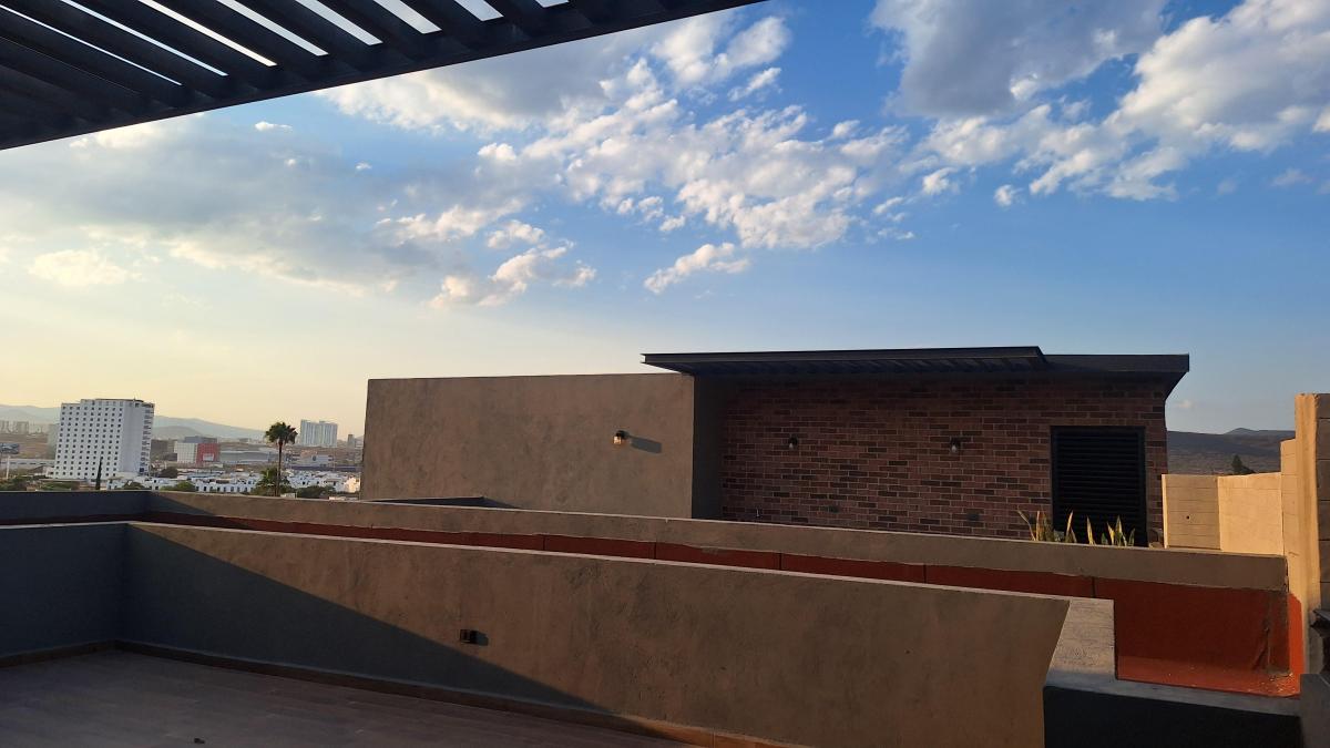 Rooftop privado con pérgola del loft en Palmares